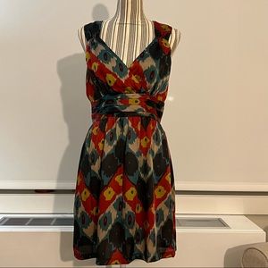 Abstract mini dress with cutouts size medium